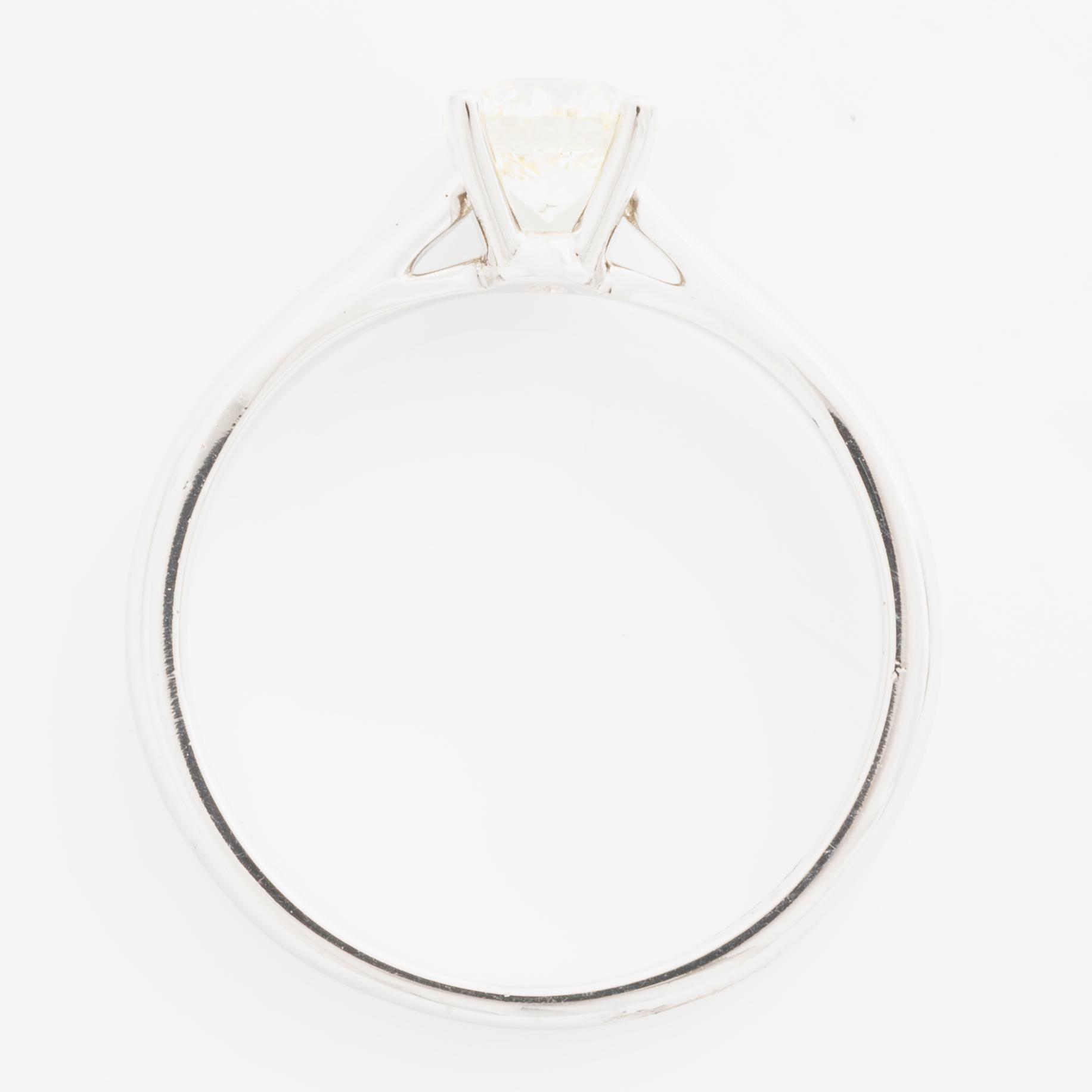 Ring with brilliant-cut diamond.