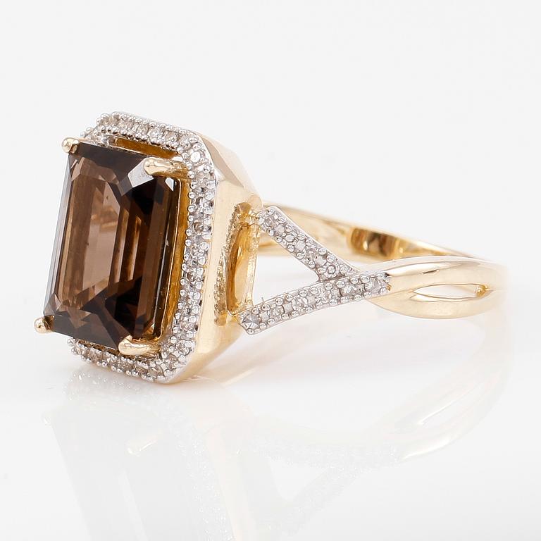 RING, 14k guld, diamanter tot ca 0.15 ct. och kvartz.