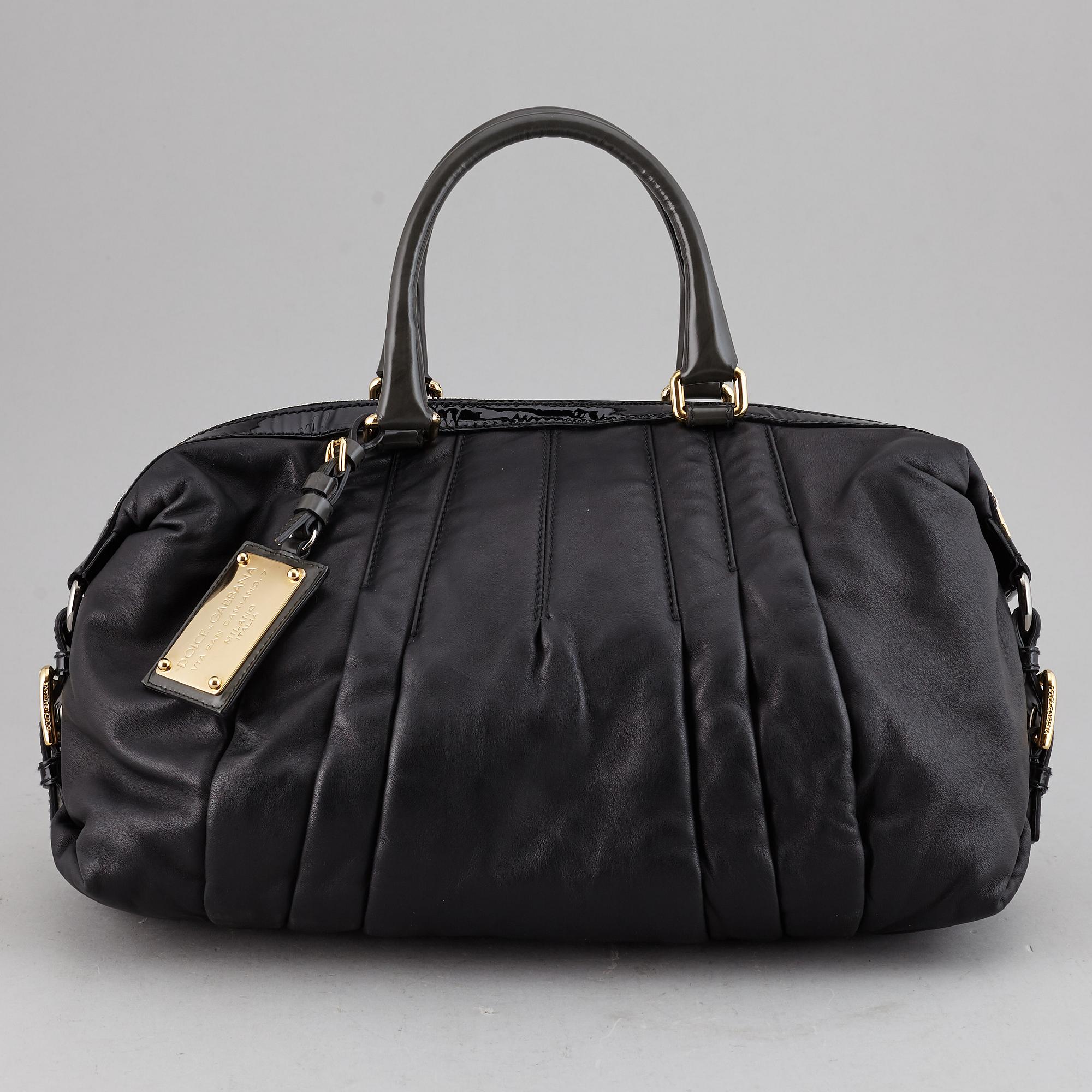 DOLCE & GABBANA, a black leather bag.