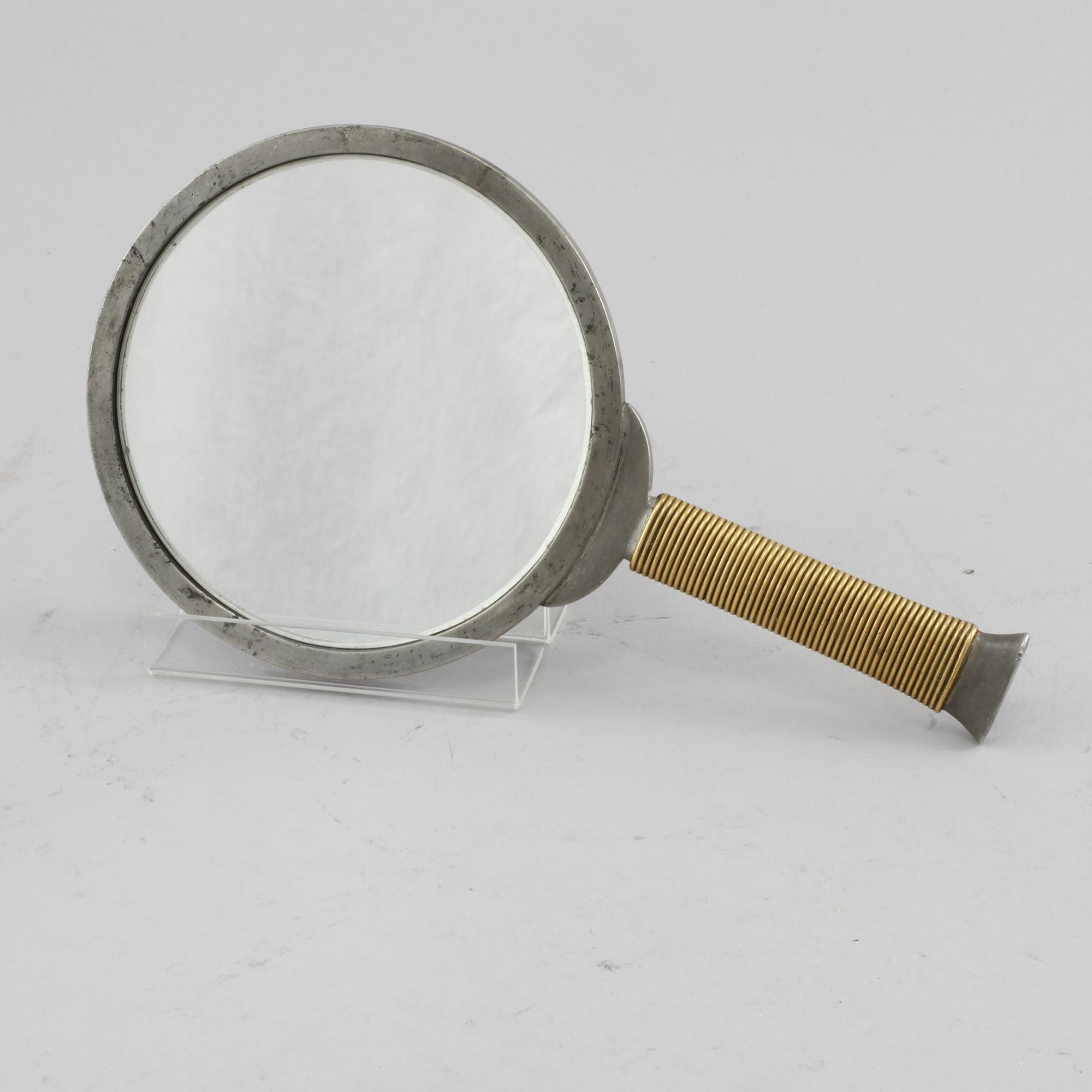 HANDSPEGEL, tenn, komponerad av Estrid Erikson och Björn Trägårdh, Firma Svenskt Tenn, 1900-tal.