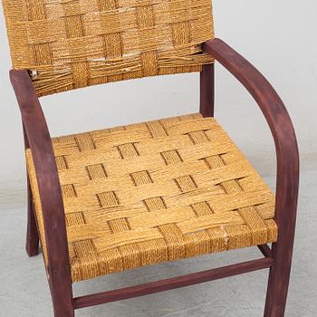 AXEL LARSSON, a stained beech armchair from Bodafors, 1930's.