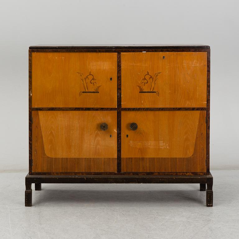 A 1930s cabinet by E. Pettersson, Gefle, Sweden.