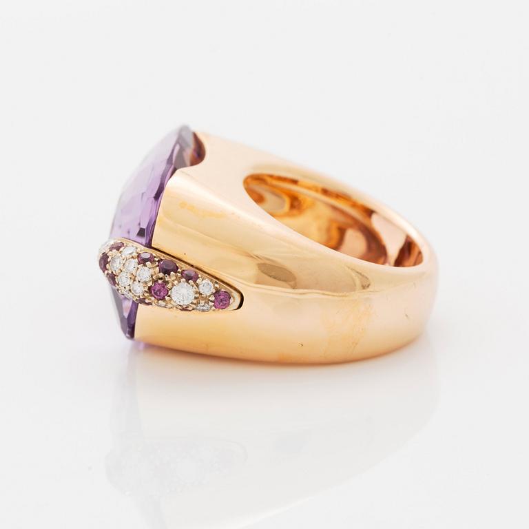 A Pomellato ring set with amethysts and round brilliant-cut diamonds.