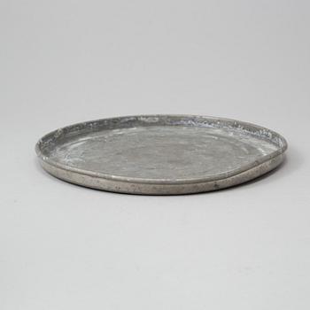 A pewter serving tray mark of FIRMA SVENSKT TENN, Stockholm, 1928.