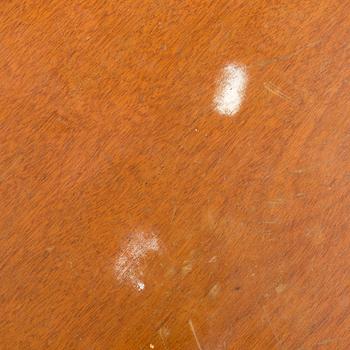 A 1940s mahogany veneer table.