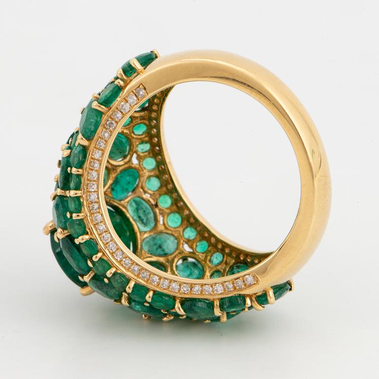 Emerald and brilliant-cut diamond ring.