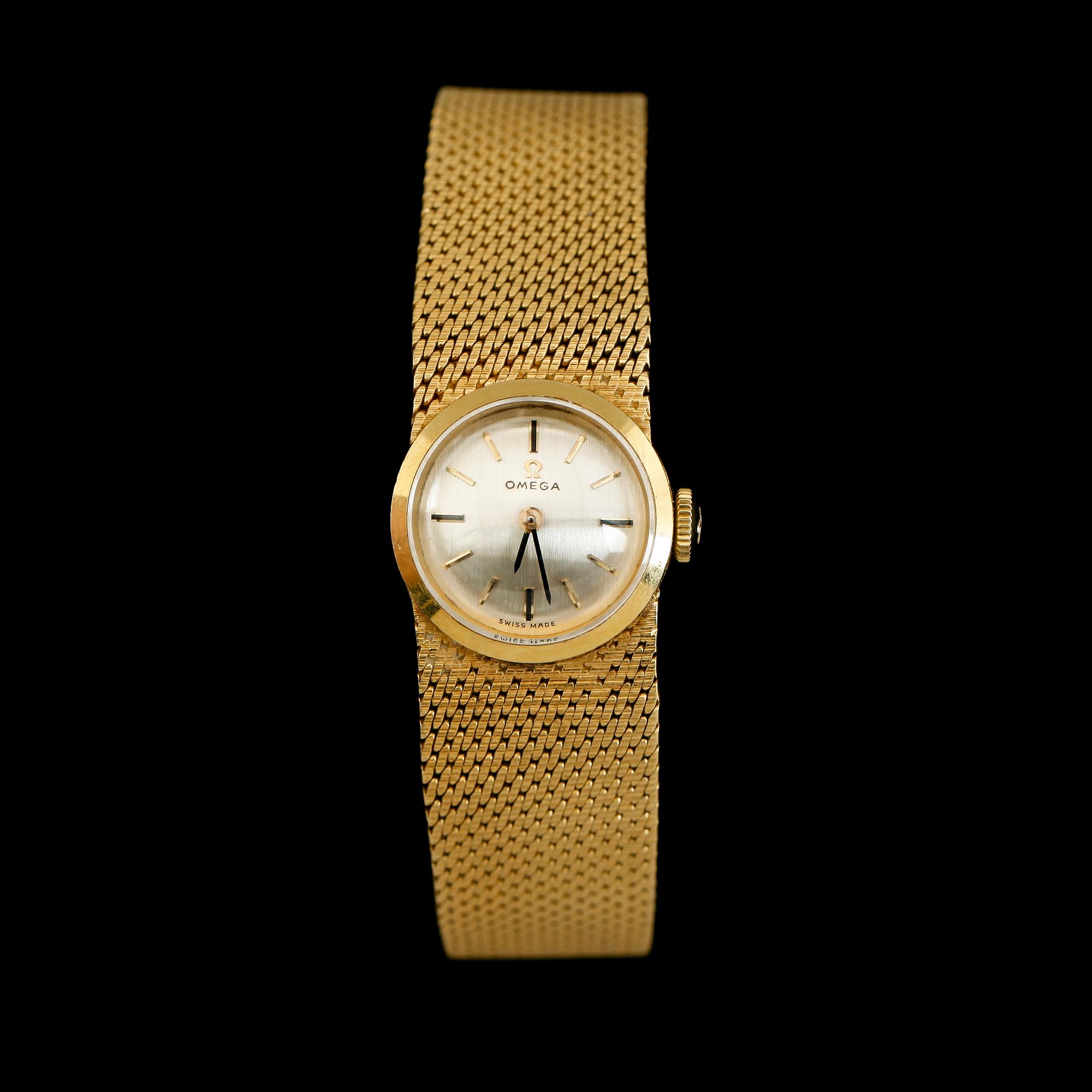 ARMBANDSUR, 18K guld, Omega. Total vikt inklusive urhus ca 43 g.
