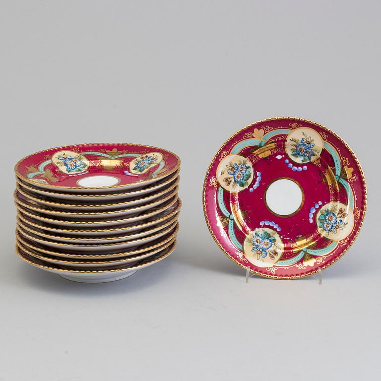 12 Russian porcelain Kuznetsov plates, probably for the Iranian market, late 19th century.