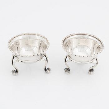 Georg Jensen, two silver salt cellars, model 20, Denmark, 1919- c. 1927.