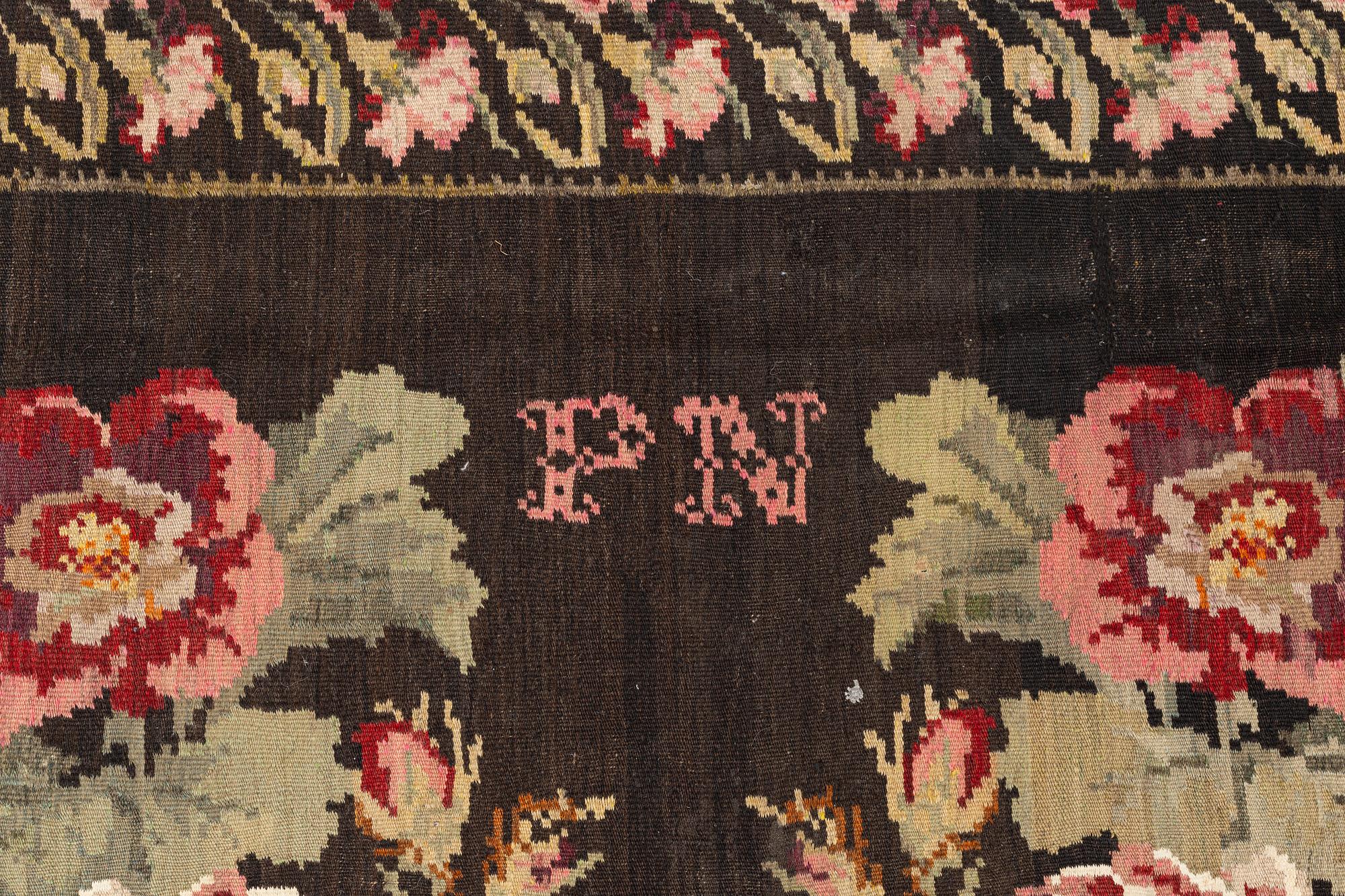 A Kelim carpet, Moldova, dated 1939, circa 385 x 174 cm.