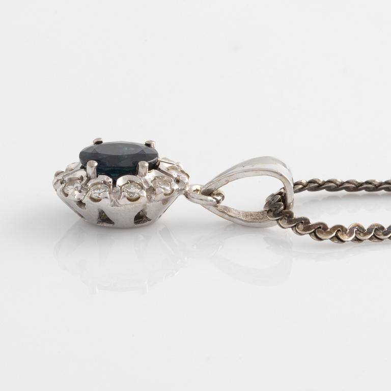 Pendant and a pair of earrings, white gold with sapphires and brilliant-cut diamonds.