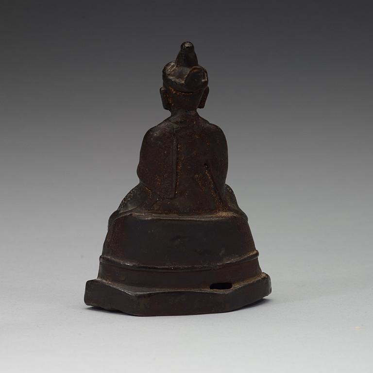 A seated bronze figure of a monk, Ming dynasty (1368-1644).