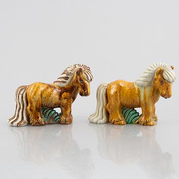 Gunnar Nylund, a pair of stoneware figurines, Rörstrand, Sweden, mid 20th century.
