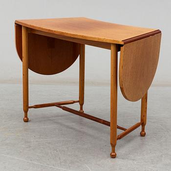 JOSEF FRANK, a model 1333 mahogany table from Firma Svenskt Tenn.