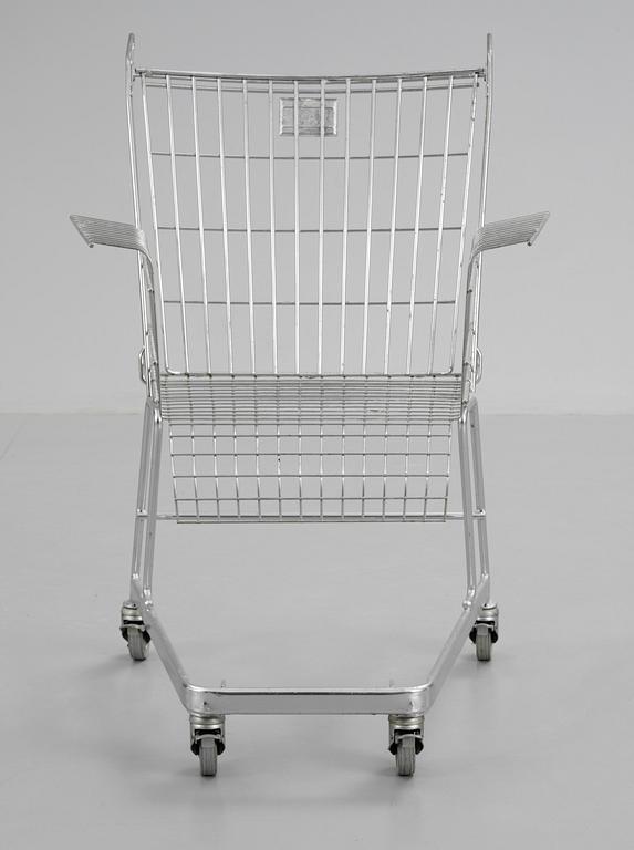 A Frank Schriener 'Consumer's Rest'  galvanized steel wire shopping cart chair, model 2, Stiletto Studios,