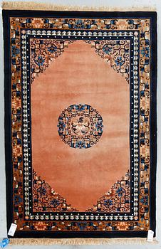 A rug, Old Kina, ca 198 x 130 cm.