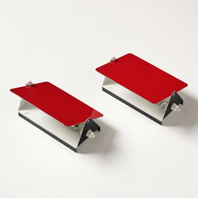 Charlotte Perriand, a pair of wall lights model "CP1", La Société Centrale d'Eclairage, France, 1960s.