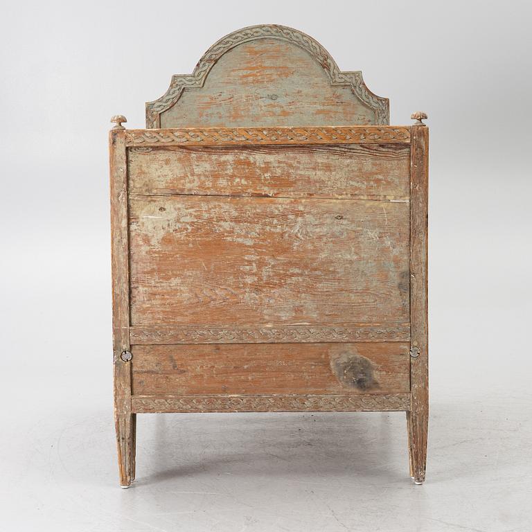 A Gustavian carved bedframe, late 18th century.