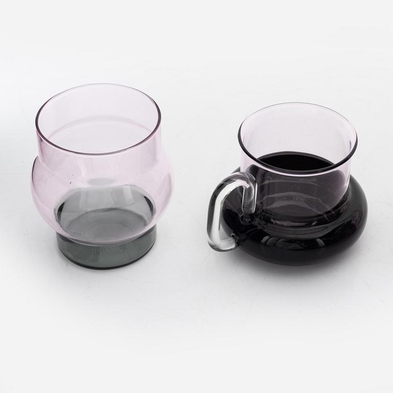 Tom Dixon, A 'Bump' glass teapot with for cups and a pair of glasses.