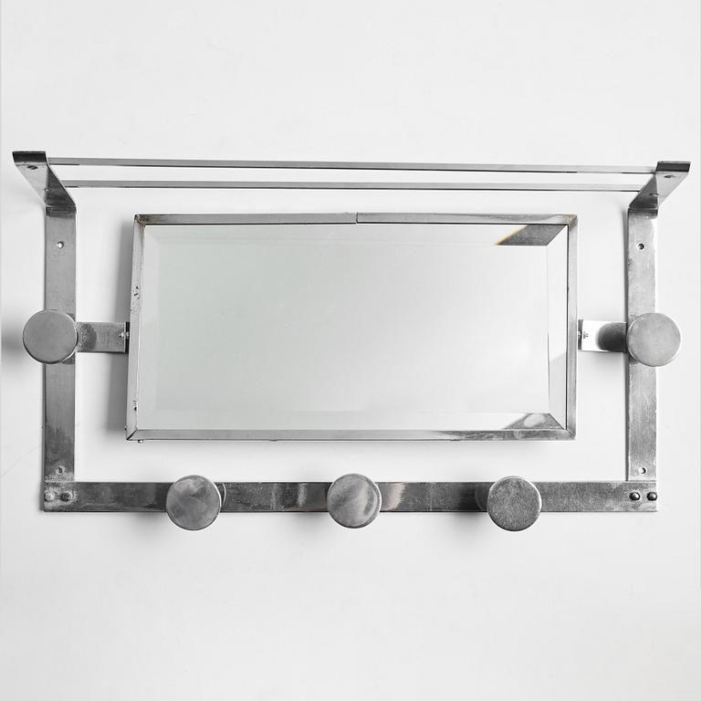 A mid 20th century shelf with mirror.