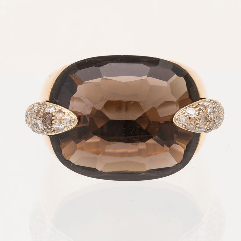 An 18K gold Pomellato "Pin Up" ring set with smoky quartz and round brilliant-cut diamonds.