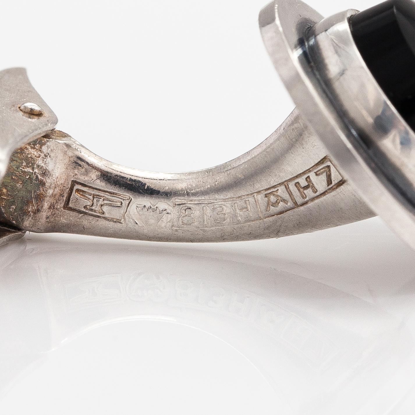 Elis Kauppi, A pair of silver cufflinks with onyxes. Kupittaan kulta, Turku 1961.