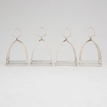 a set of four silver toastracks, Barker Brothers Birmingham 1936.