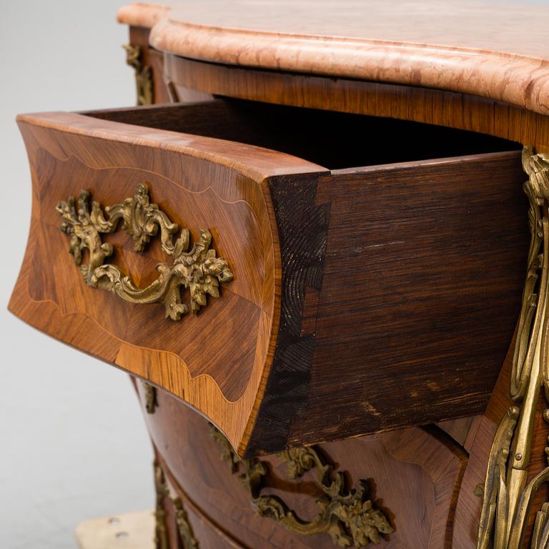 An early 20th century Central Europe Louis XV style chest of drawers.