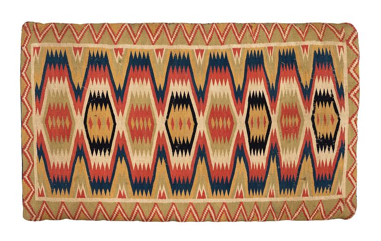 A carriage cushion, double-interlocked tapestry, ca 81 x 50 cm, Scania, mid 19th century.