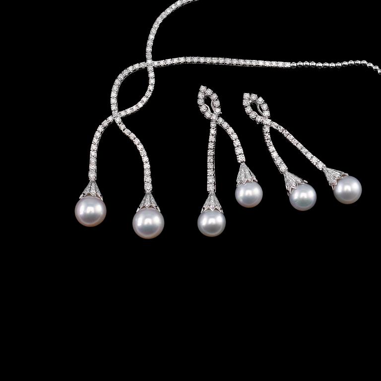 A SET OF JEWELLERY, brilliant cut diamonds c. 10.25 ct. South sea pearls 13 - 14 mm. Weight 70 g.