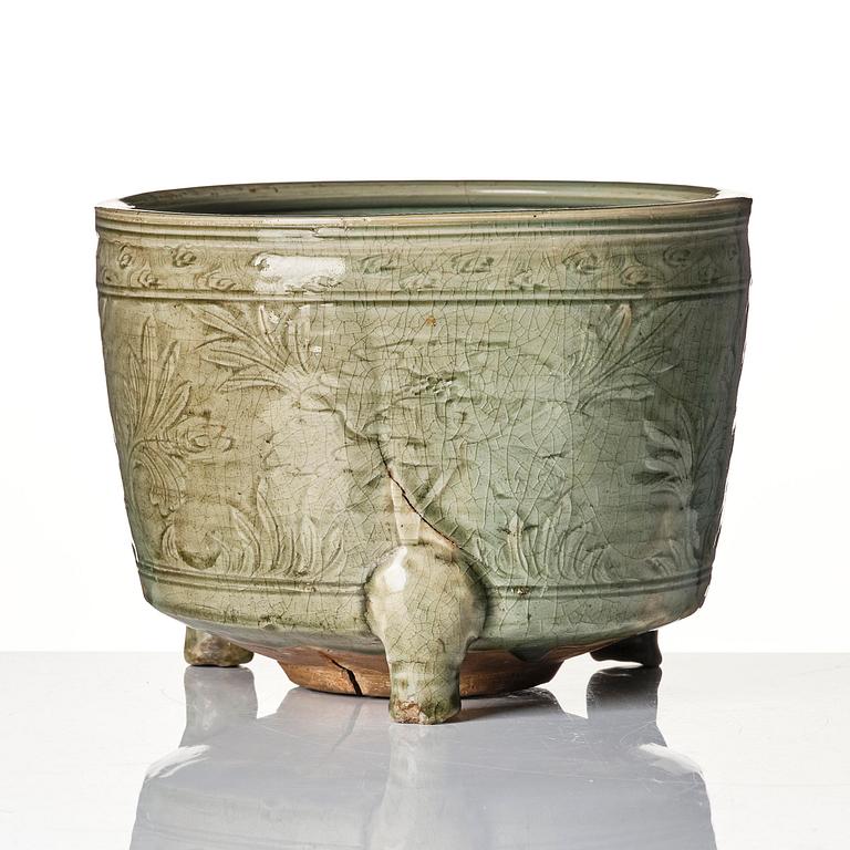 A massive celadon tripod censer, Yuan/Ming dynasty.