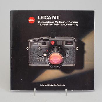 A black body Leica M6 no 1725111 from 1987 with Elmar 1:4/135. With original box.
