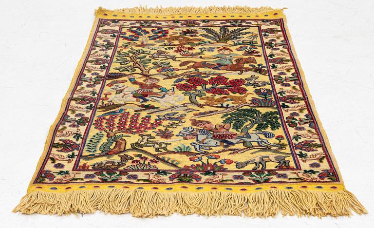 An old oriental rug, soul, figural, c. 106 x 74 cm.