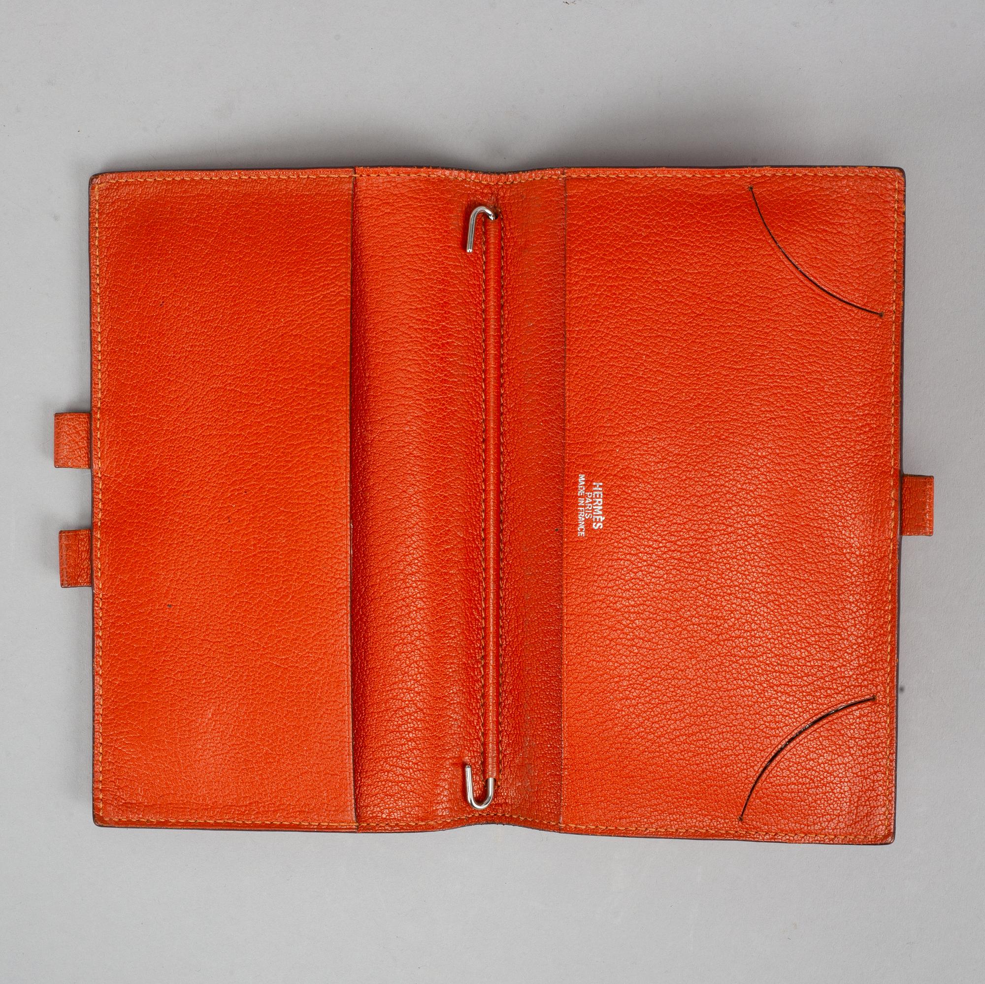 Hermès, scarf and leather cover.