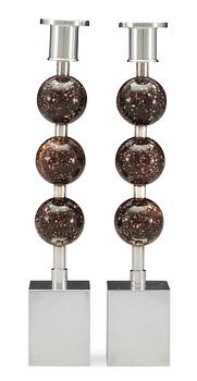 585. A pair of Sigurd Persson silver plated and porphyry candlesticks, Sweden.