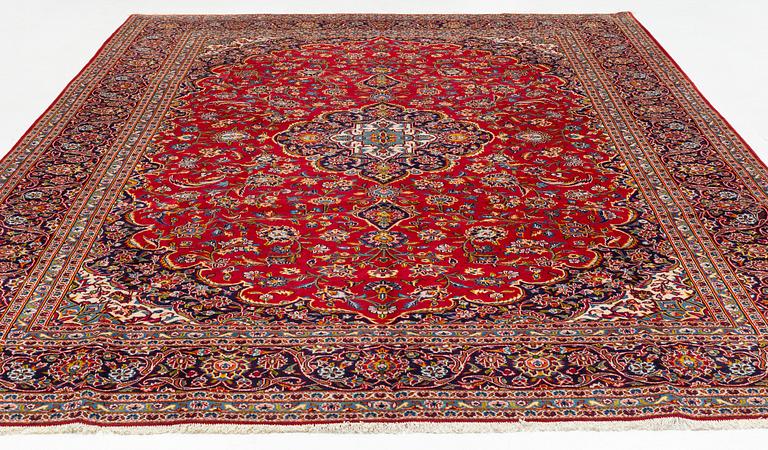 A Keshan carpet, approximately 408 x 287 cm.