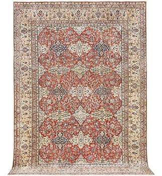 A semi-antique/old Nain carpet, part silk, c. 343 x 230 cm.