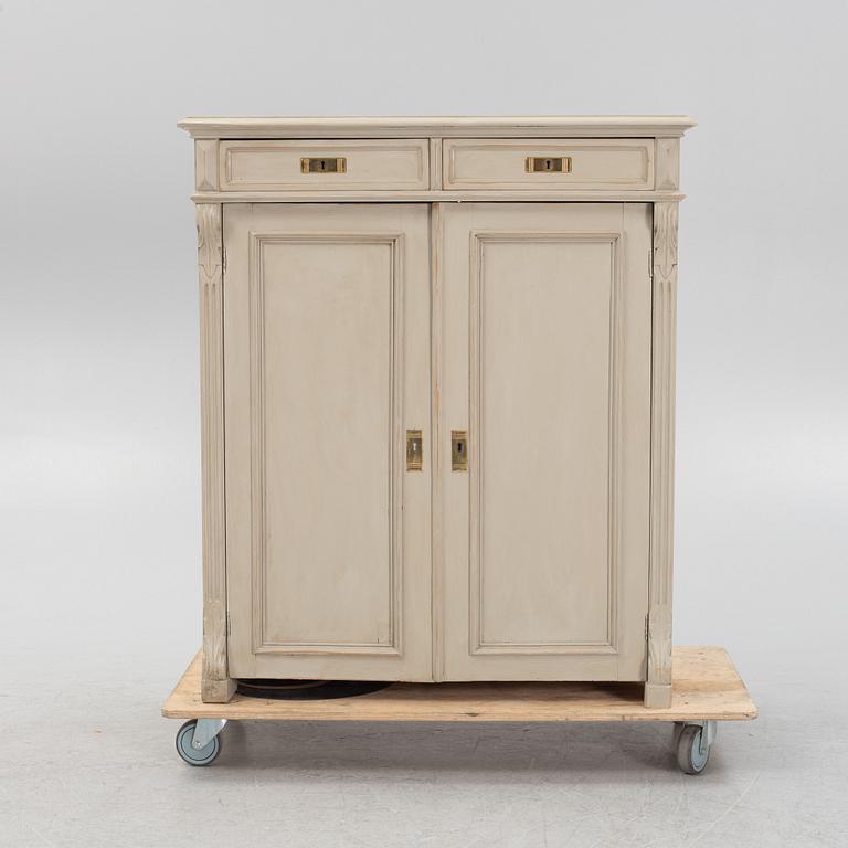 A painted cabinet from around the year 1900.