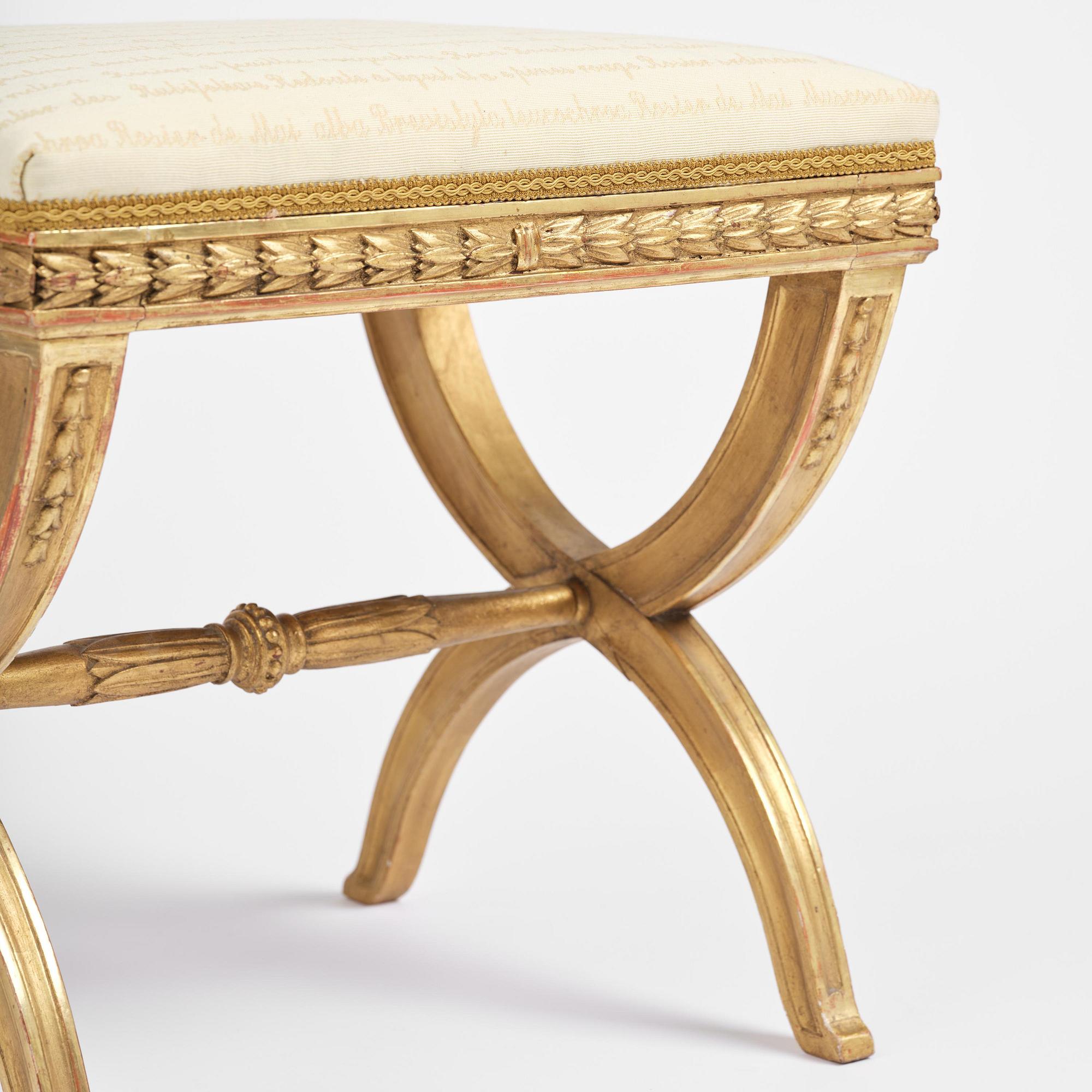 A pair of late Gustavian giltwood stools, Stockholm, late 18th century.