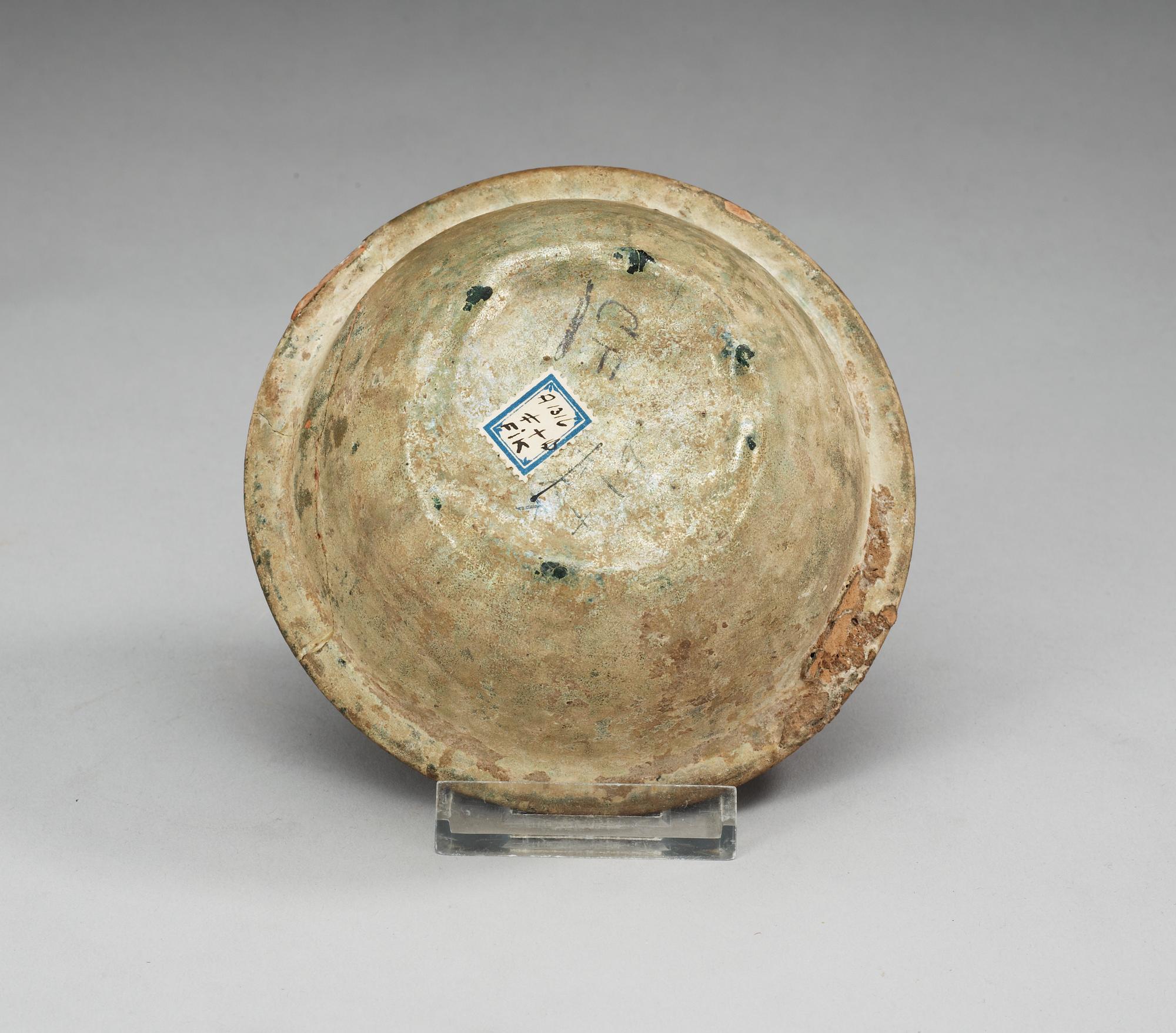 A green glazed bowl, Han dynasty (206 BC – 220 AD).