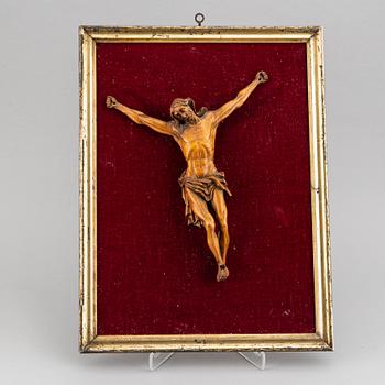 A carved wood crucifix, 17th/18th century.