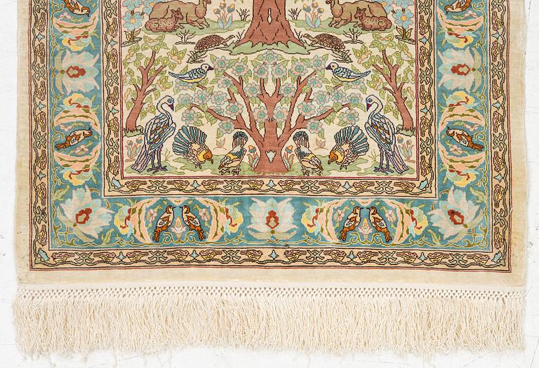 A figural silk Hereke rug, c 65 x 47 cm.