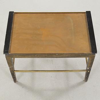 A tray table from the first half of the 20th century by Ystad Brons.