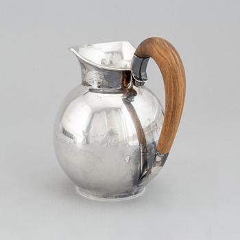 A sterling silver pitcher, Helsinki, Finland 1963.