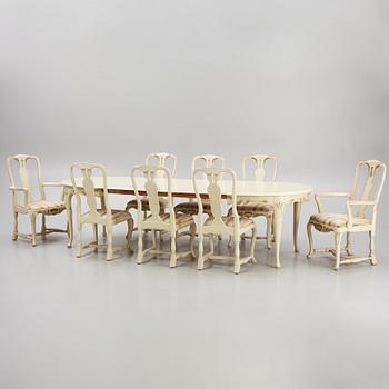 A Rococo style Dining Table with Chairs, first half of the 20th Century.