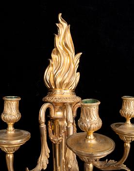 A pair of Louis XVI late 18th century gilt bronze three-light wall-lights.