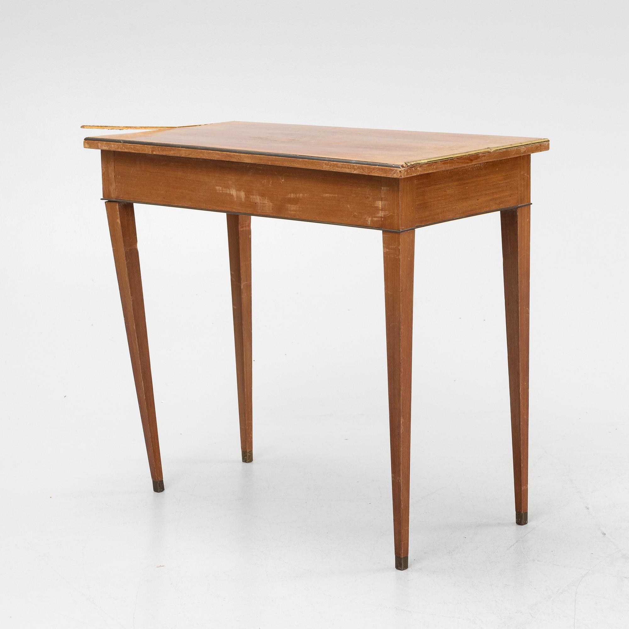 A late Gustavian style mahogany table with drawers.