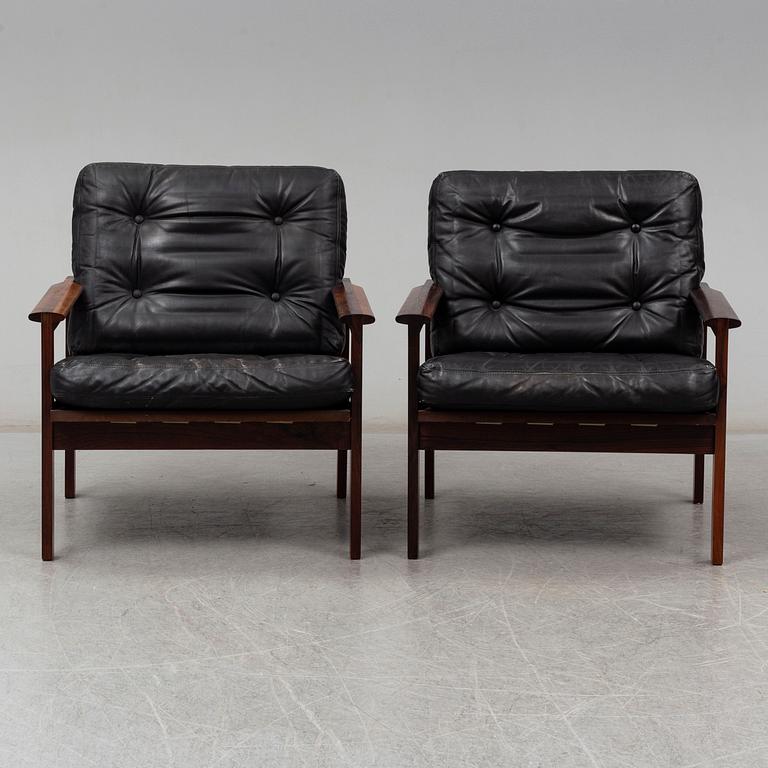 A pair of 'Capella' rosewood easy chairs by Illum Wikkelsø.