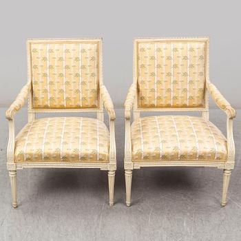 A pair of late 18th century Louis XVI armchairs.