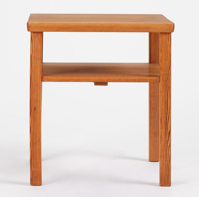 Axel Einar Hjorth, a stained pine "Värmdö" table, Nordiska Kompaniet, Sweden, 1930s.